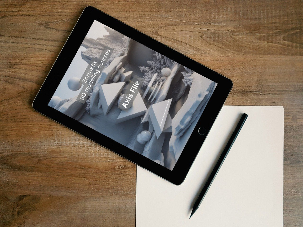 Tablet displaying 3D modeling software on a wooden surface with a pen.